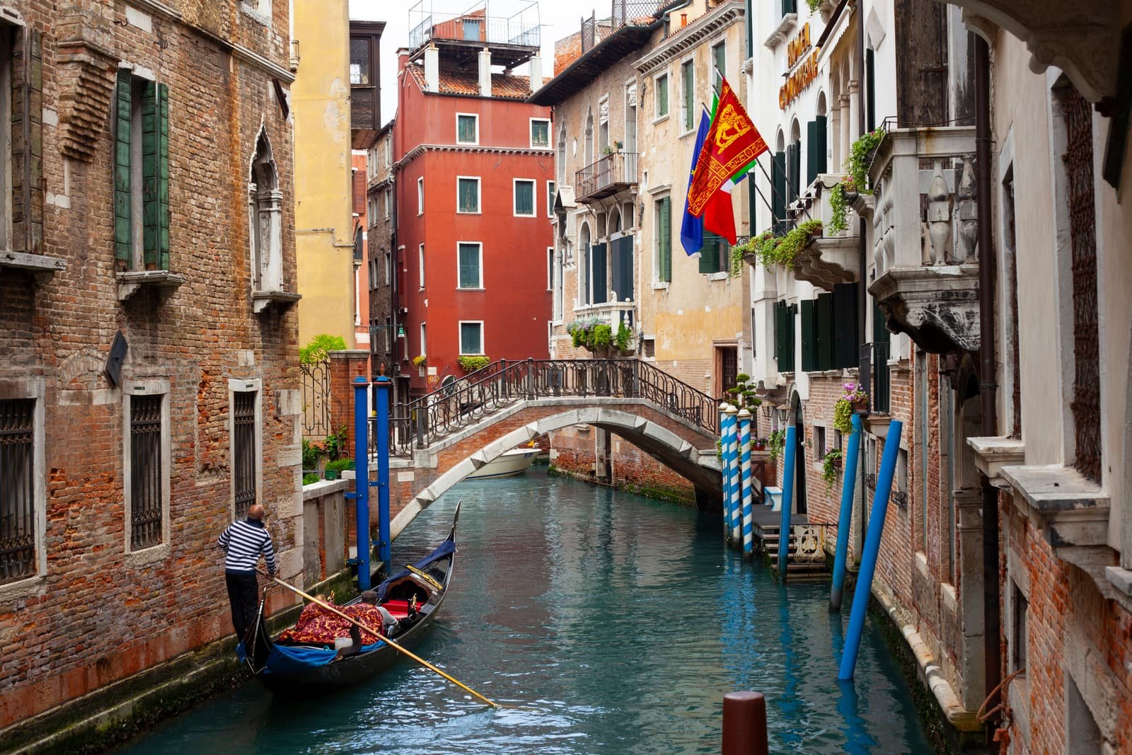 An arched bridge over a canal in Venice